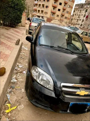 شيفروليه افيو 2009 أبيض مستعملة للبيع