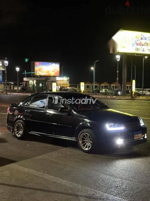 شيفروليه أوبترا 2009 أسود مستعملة للبيع - 1