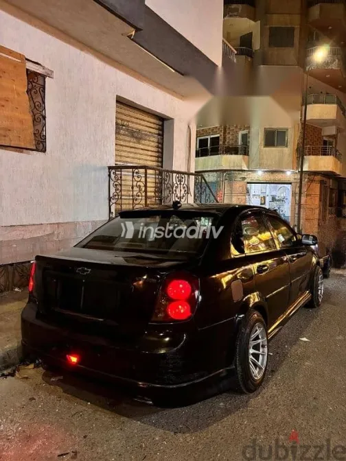 شيفروليه أوبترا 2009 أسود مستعملة للبيع - 3