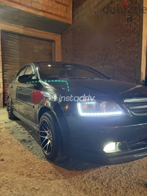 شيفروليه أوبترا 2009 أسود مستعملة للبيع - 5