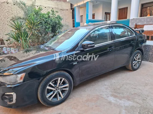 ميتسوبيشي لانسر اى اكس شارك 2015 أبيض مستعملة للبيع - 2