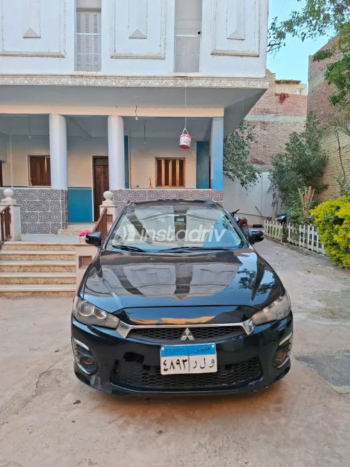 ميتسوبيشي لانسر اى اكس شارك 2015 أبيض مستعملة للبيع - 7