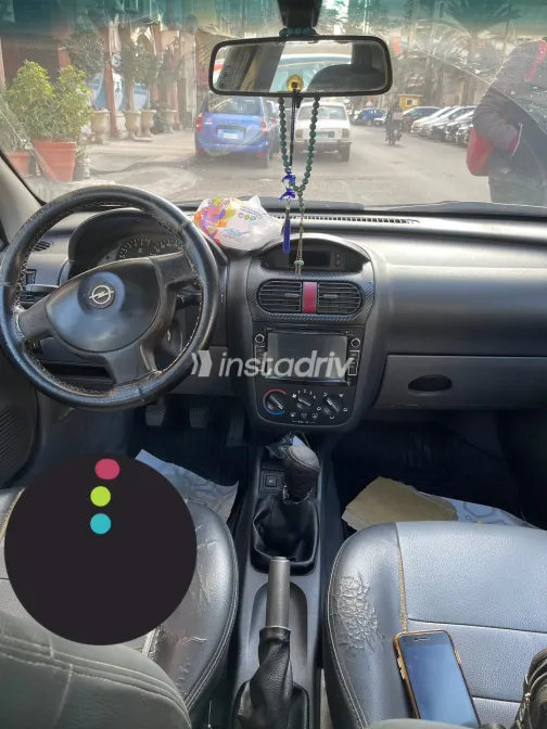 اوبل كورسا 2004 أبيض مستعملة للبيع - 1