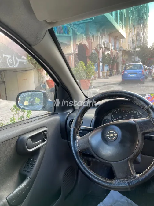 اوبل كورسا 2004 أبيض مستعملة للبيع - 2