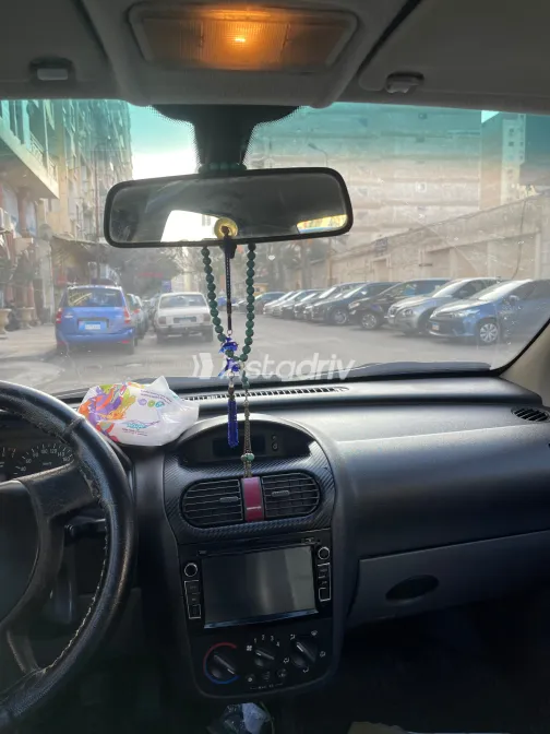 اوبل كورسا 2004 أبيض مستعملة للبيع - 7