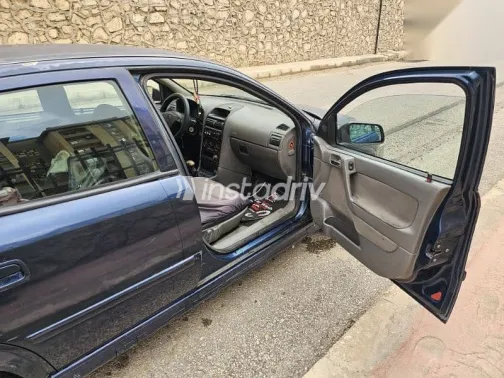 اوبل أسترا 2003 أزرق غامق مستعملة للبيع - 5