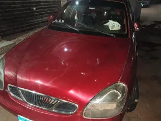 دايو نوبيرا 2 2002 أحمر غامق مستعملة للبيع