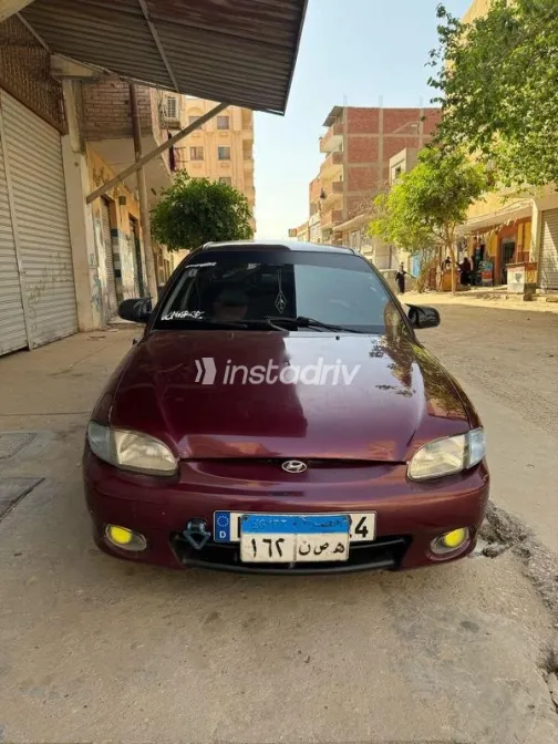 هيونداي اكسنت 1999 أحمر مستعملة للبيع - 1