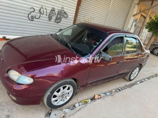 هيونداي اكسنت 1999 أحمر مستعملة للبيع - 2