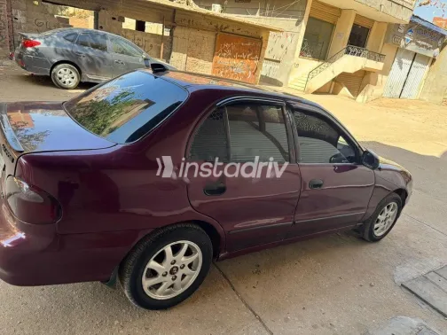 هيونداي اكسنت 1999 أحمر مستعملة للبيع - 4