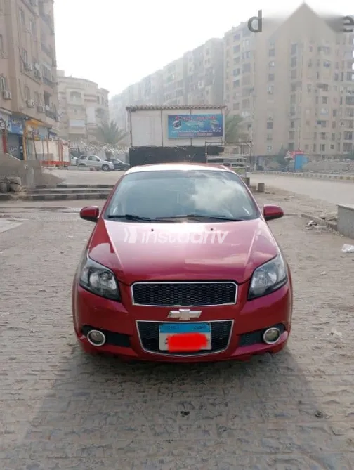شيفروليه افيو 2015 أحمر مستعملة للبيع - 5