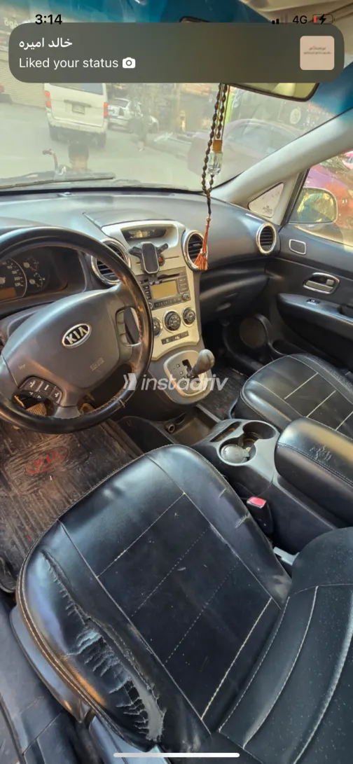 كيا كارينز 2010 أبيض مستعملة للبيع - 4