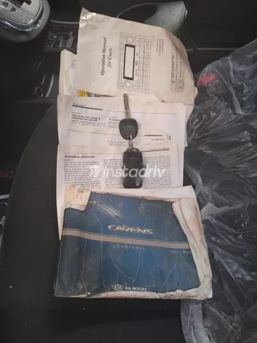 كيا كارينز 2012 أسود مستعملة للبيع - 2