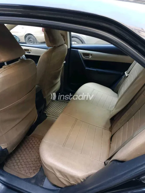 تويوتا كورولا 2014 أبيض مستعملة للبيع - 4