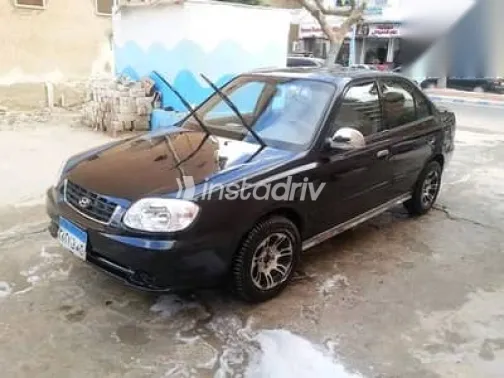 هيونداي فيرنا 2010 أسود مستعملة للبيع - 1