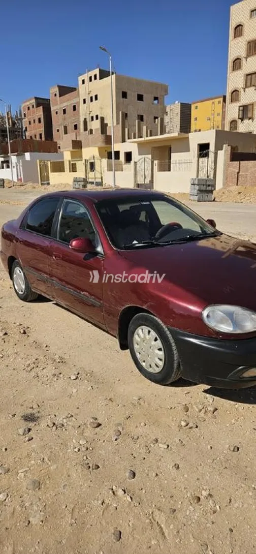 شيفروليه لانوس 2014 أحمر غامق مستعملة للبيع - 1