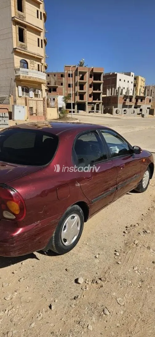 شيفروليه لانوس 2014 أحمر غامق مستعملة للبيع - 2