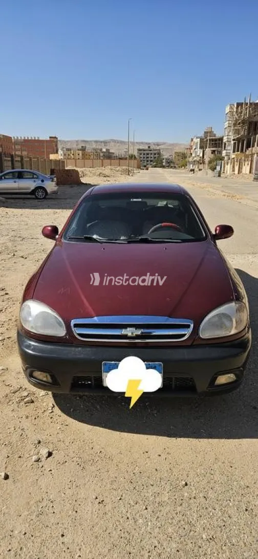 شيفروليه لانوس 2014 أحمر غامق مستعملة للبيع - 4