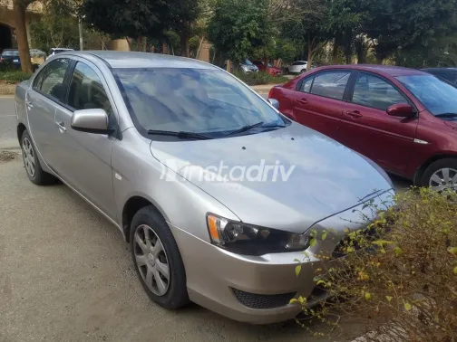 ميتسوبيشي لانسر اى اكس شارك 2014 ذهبي مستعملة للبيع - 2