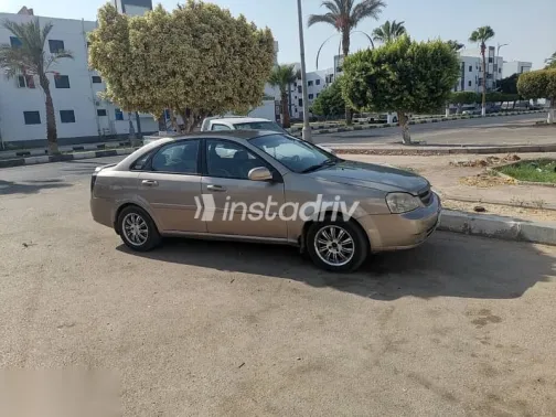 شيفروليه أوبترا 2008 ذهبي مستعملة للبيع - 5