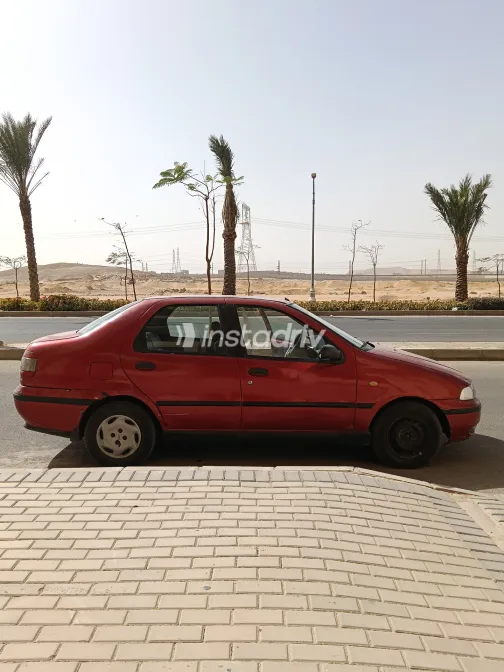 فيات سينا 2001 أبيض مستعملة للبيع - 1