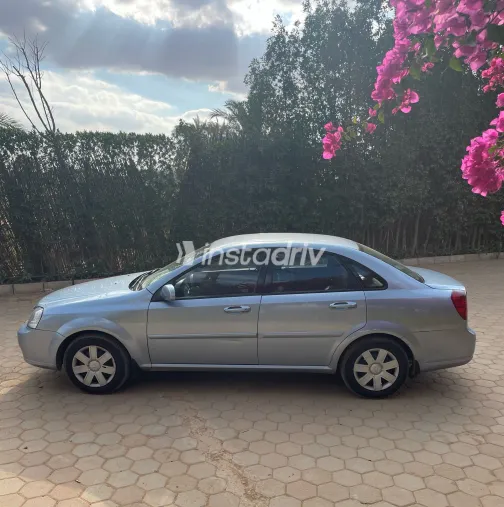 شيفروليه أوبترا 2011 أبيض مستعملة للبيع - 2