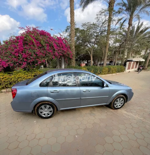 شيفروليه أوبترا 2011 أبيض مستعملة للبيع - 3