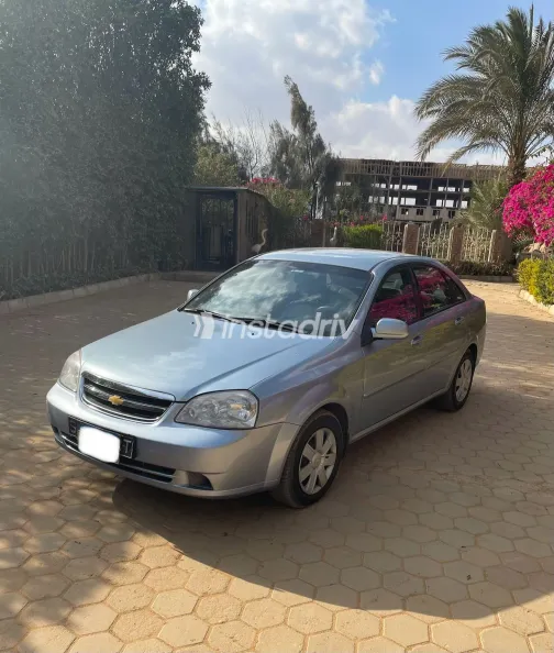 شيفروليه أوبترا 2011 أبيض مستعملة للبيع - 4