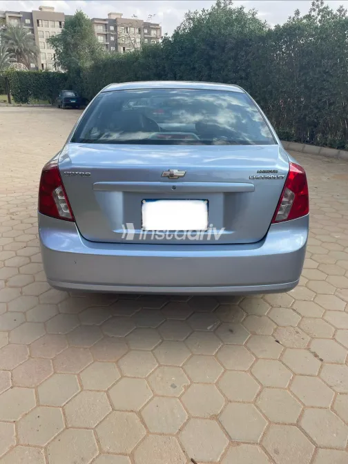 شيفروليه أوبترا 2011 أبيض مستعملة للبيع - 5