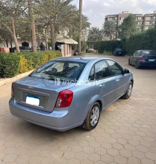 شيفروليه أوبترا 2011 أبيض مستعملة للبيع - 6