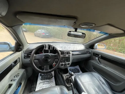 شيفروليه أوبترا 2011 أبيض مستعملة للبيع - 7