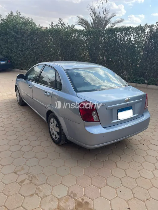 شيفروليه أوبترا 2011 أبيض مستعملة للبيع - 8