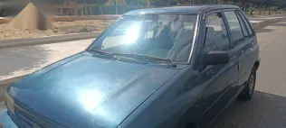 كيا برايد 1999 أزرق غامق مستعملة للبيع