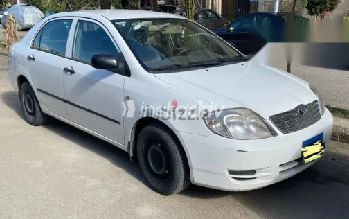 تويوتا كورولا 2003 أبيض مستعملة للبيع - 2