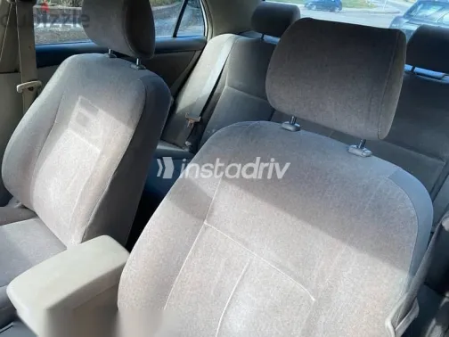 تويوتا كورولا 2003 أبيض مستعملة للبيع - 3