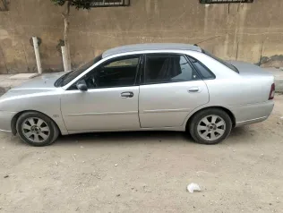 بروتون واجا 2005 أبيض مستعملة للبيع