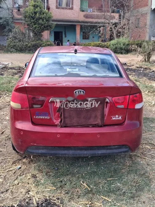 كيا سيراتو 2009 أحمر غامق مستعملة للبيع - 2