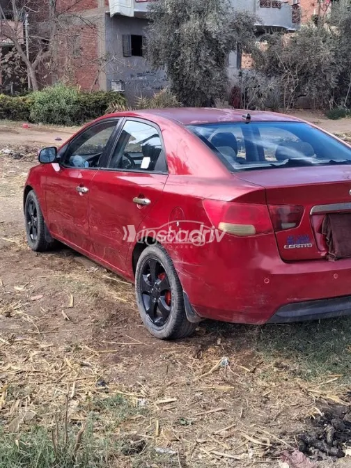 كيا سيراتو 2009 أحمر غامق مستعملة للبيع - 3