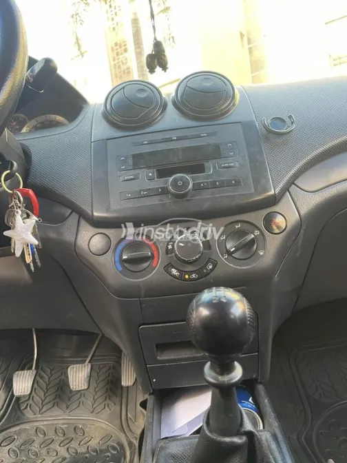 شيفروليه افيو 2009 أحمر مستعملة للبيع - 3