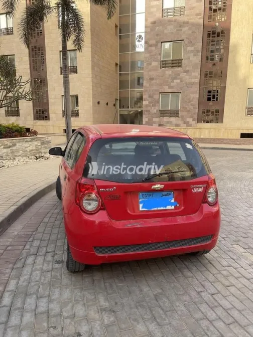 شيفروليه افيو 2009 أحمر مستعملة للبيع - 5