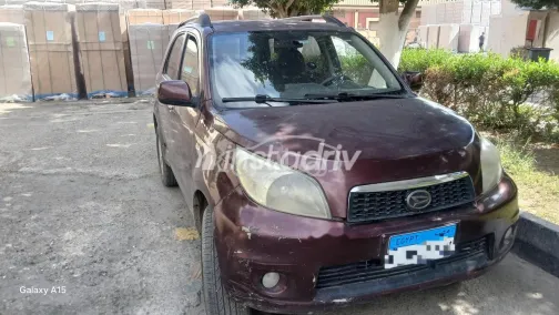 دايهاتسو جراند تريوس 2014 أحمر غامق مستعملة للبيع - 1