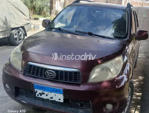 دايهاتسو جراند تريوس 2014 أحمر غامق مستعملة للبيع - 2