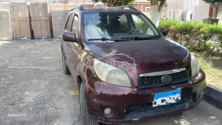 دايهاتسو جراند تريوس 2014 أحمر غامق مستعملة للبيع