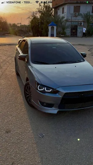 ميتسوبيشي لانسر اى اكس شارك 2016 أبيض مستعملة للبيع