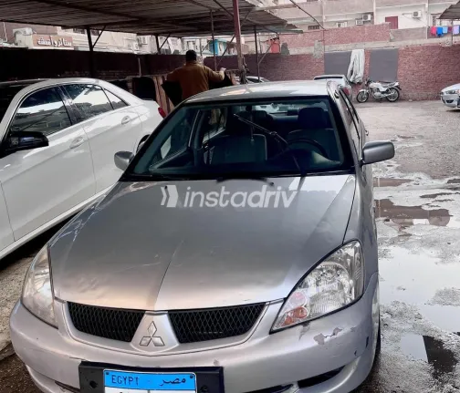 ميتسوبيشي لانسر 2010 فضي مستعملة للبيع - 3