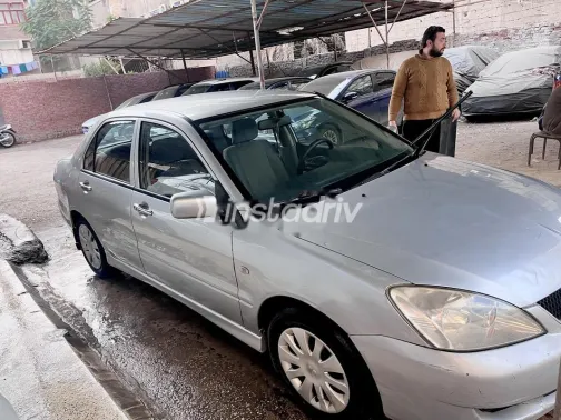 ميتسوبيشي لانسر 2010 فضي مستعملة للبيع - 5