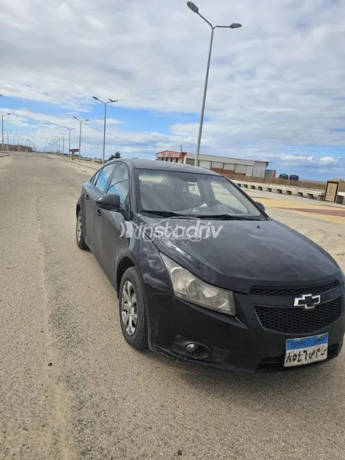 شيفروليه كروز 2010 أسود مستعملة للبيع - 5