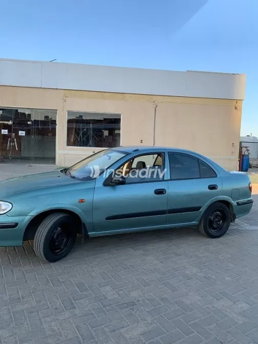 نيسان صنى 2002 أخضر مستعملة للبيع - 2