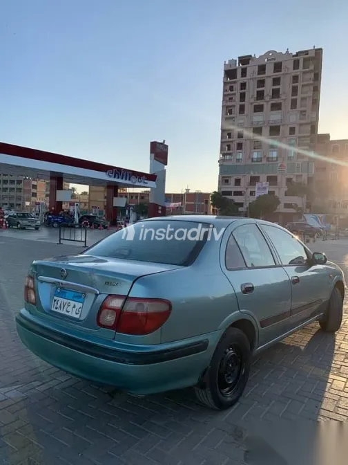 نيسان صنى 2002 أخضر مستعملة للبيع - 3