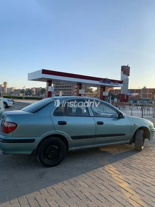 نيسان صنى 2002 أخضر مستعملة للبيع - 4